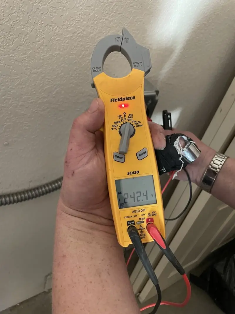 Voltage testing with clamp meter during Circuit Breaker Repair in Balch Springs